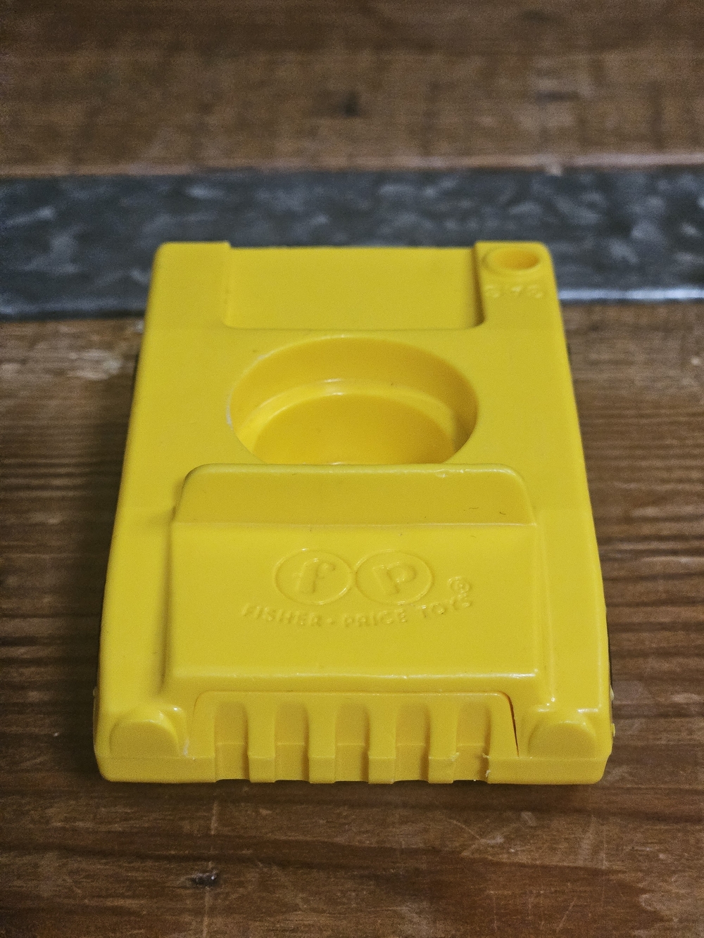 Yellow Fisher-Price Toy Car Component
